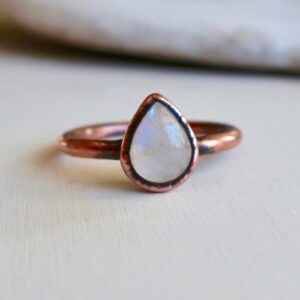 picture of a teardrop shaped moonstone copper ring